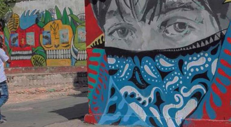       Mural en pared del barrio de San Isidro. Foto: Tomada de Redes Sociales